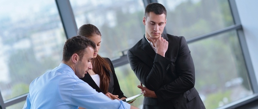 business people group on meeting and presentation in bright modern office with construction engineer architect and worker looking building model and blueprint plans-641157-edited.jpeg