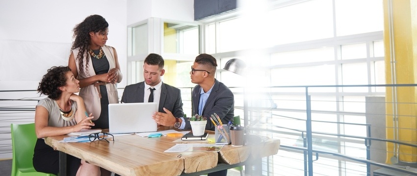 team of successful business people having a meeting in executive sunlit office-574992-edited.jpeg